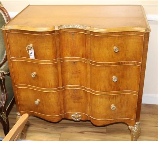 A pair of serpentine maple wood commodes, by Hille, London, W.3ft 1in. D.1ft 11in. H.3ft 2in.